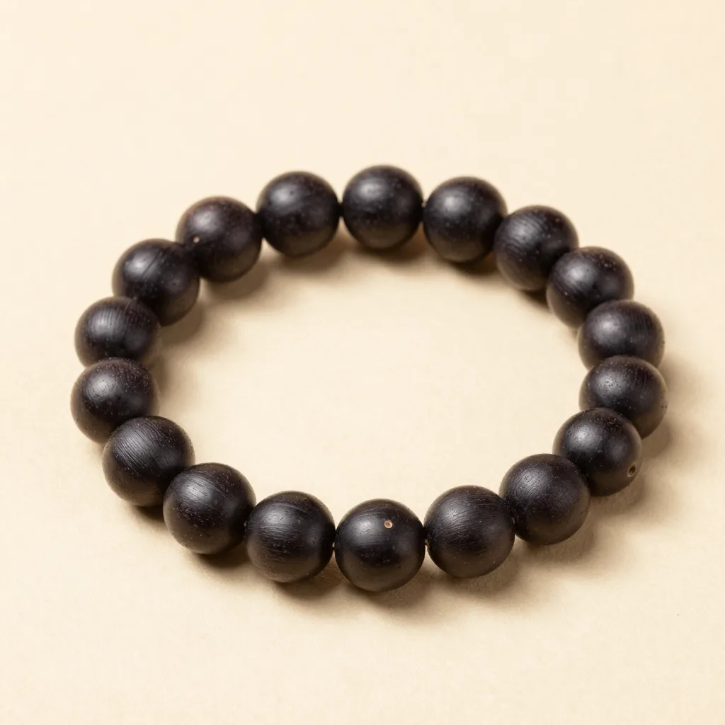 A beaded açaí seed bracelet on a light background