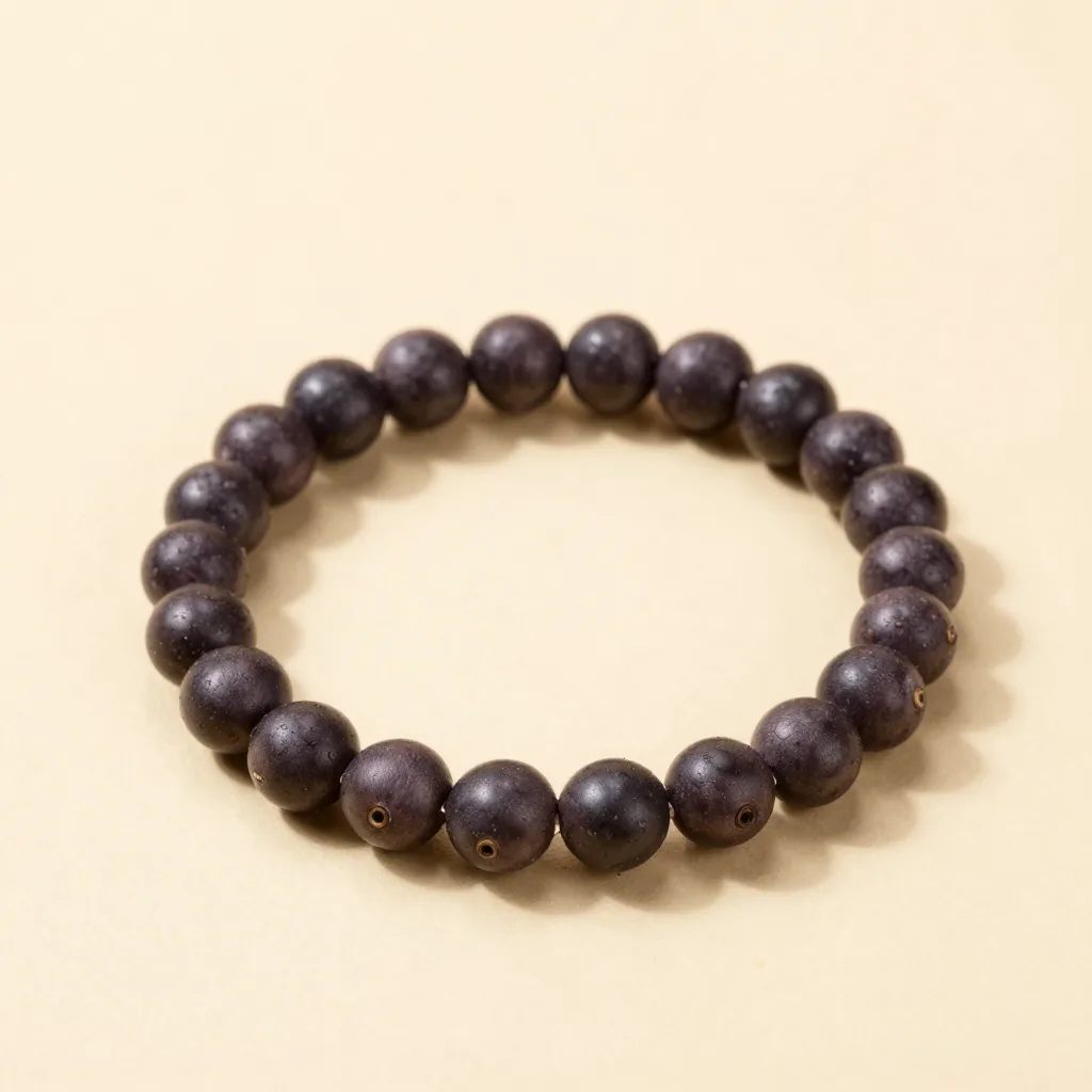 An açaí seed bracelet gift set on a light background